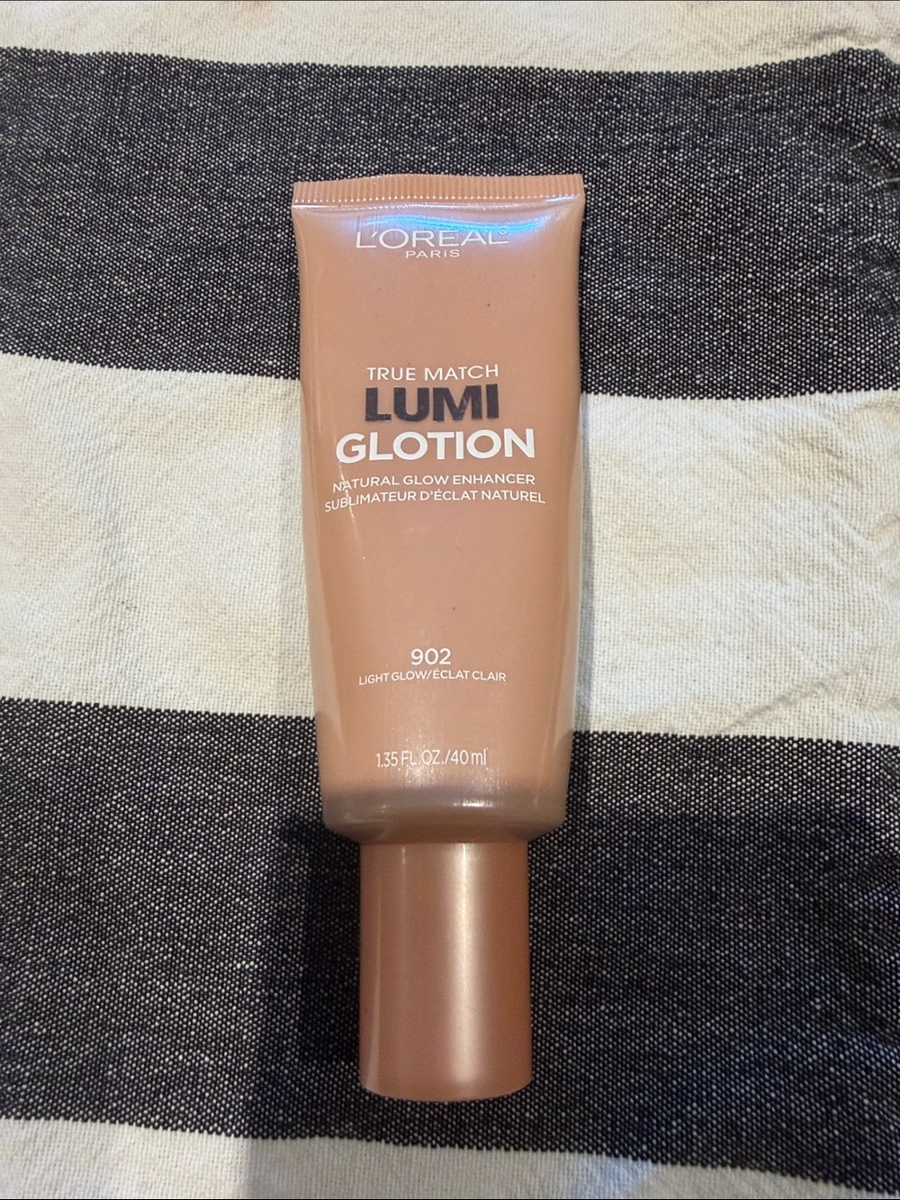 L'Oreal Lumi Glotion 902 Light Glow - Peachy Bronze